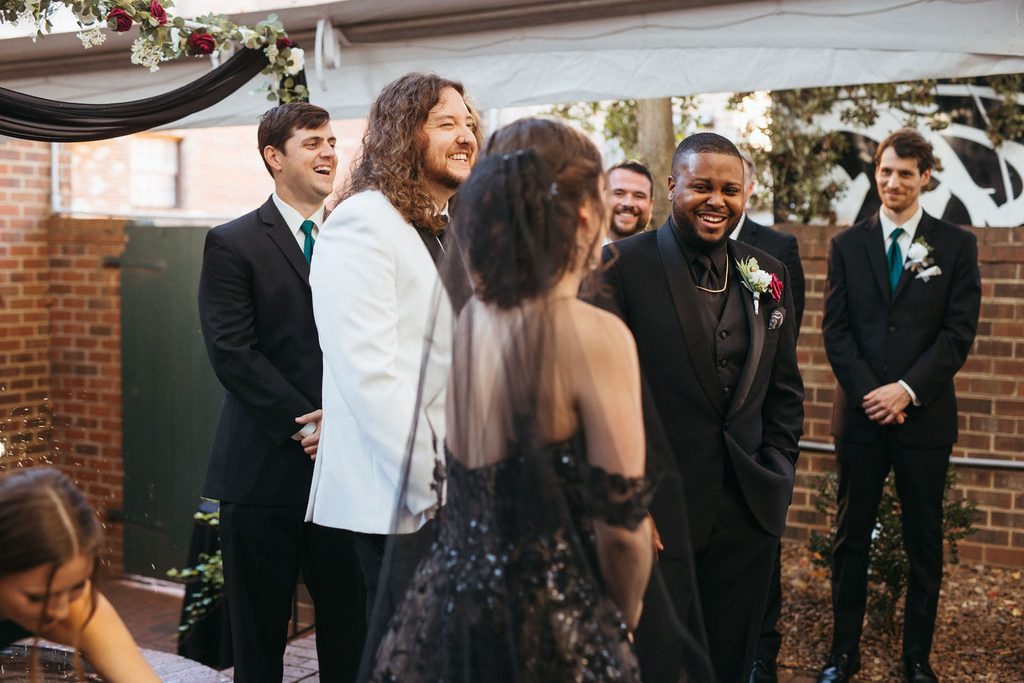 Alissa and CJ at the altar during their wedding ceremony