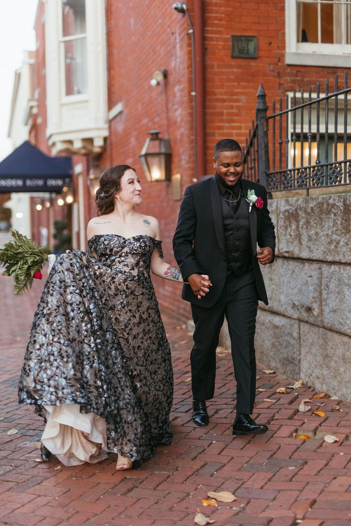 Alissa and CJ walking together on their wedding day
