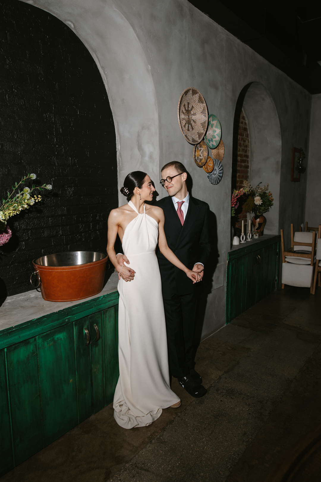 Bride and groom portrait indoors
