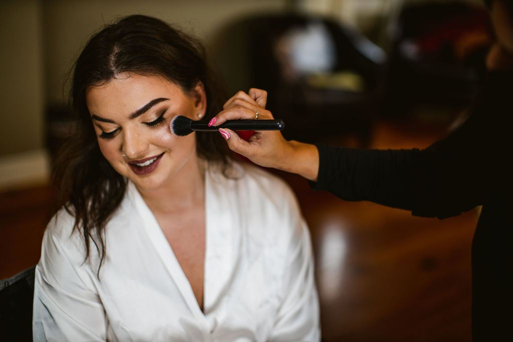 Getting ready before Mel and Josh's wedding