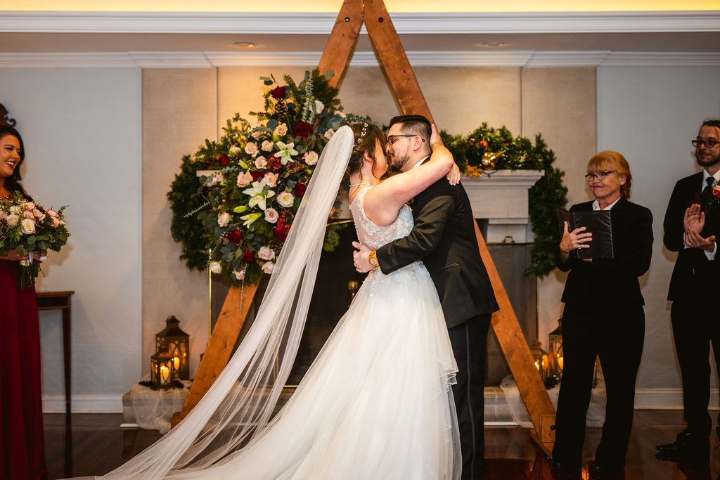 Vows and rings during Mel and Josh's wedding ceremony
