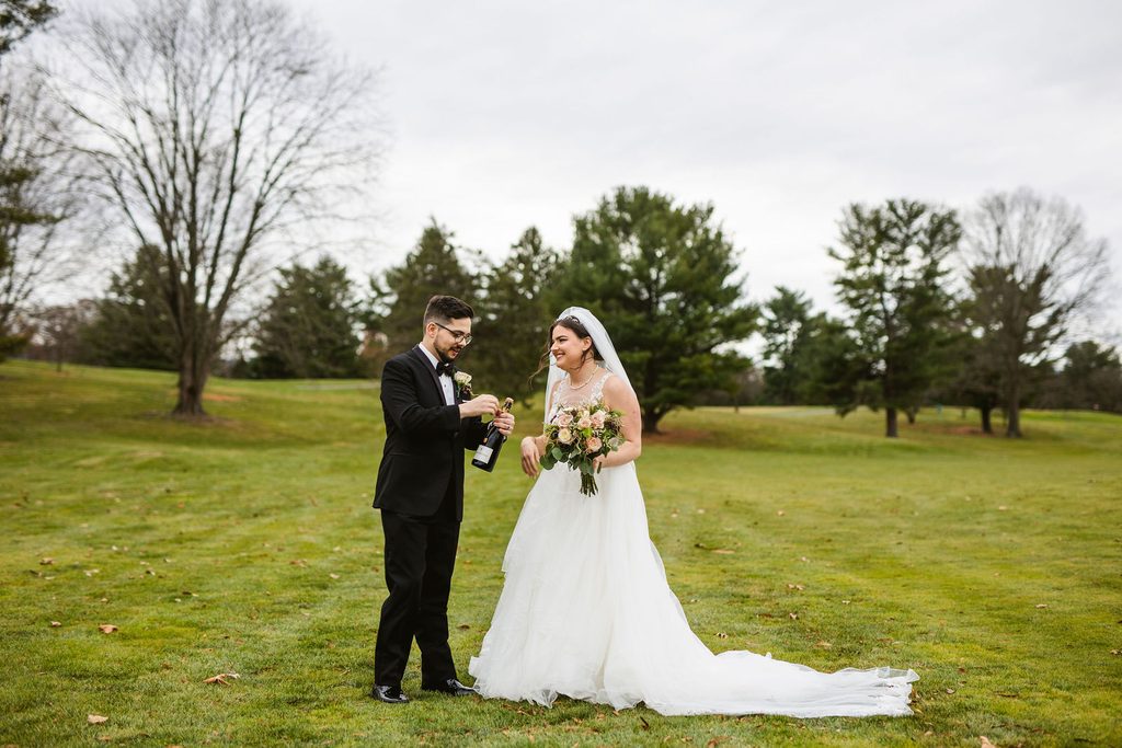 Mel and Josh walking together on their wedding day