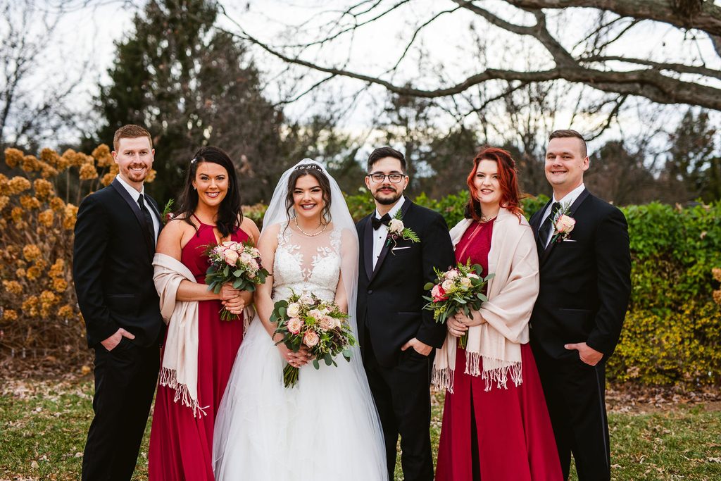 Mel and Josh with their wedding party
