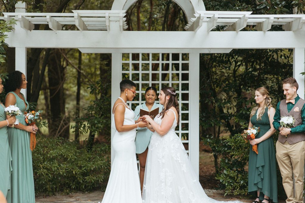 Vows and rings during Morgan and Erin's wedding ceremony
