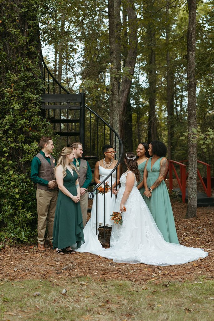 Morgan and Erin with family on their wedding day
