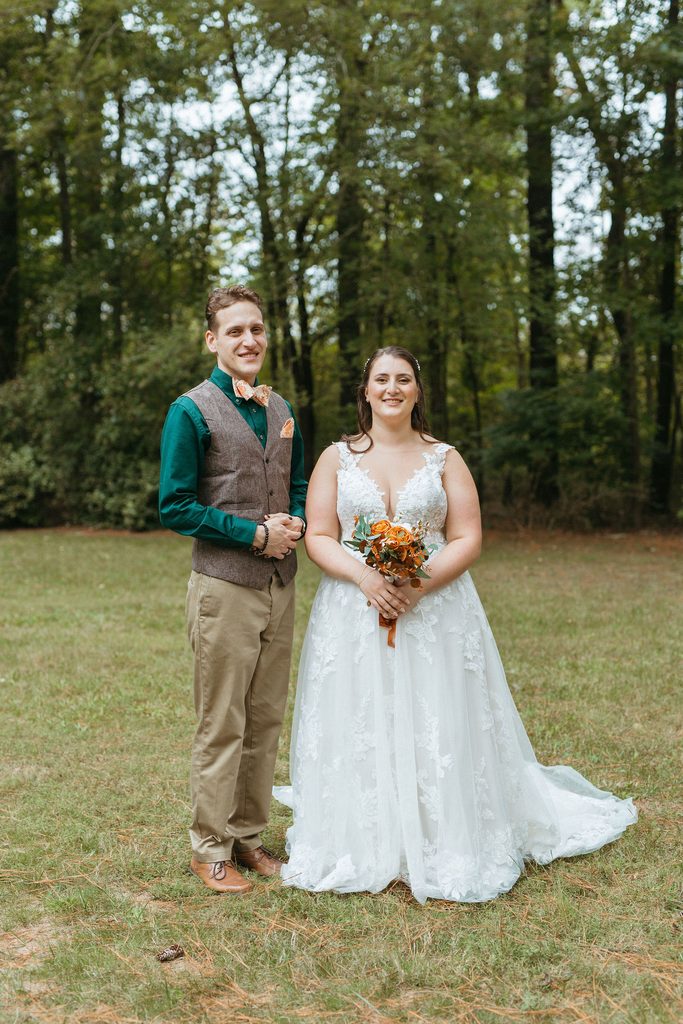 Morgan and Erin with loved ones on their wedding day